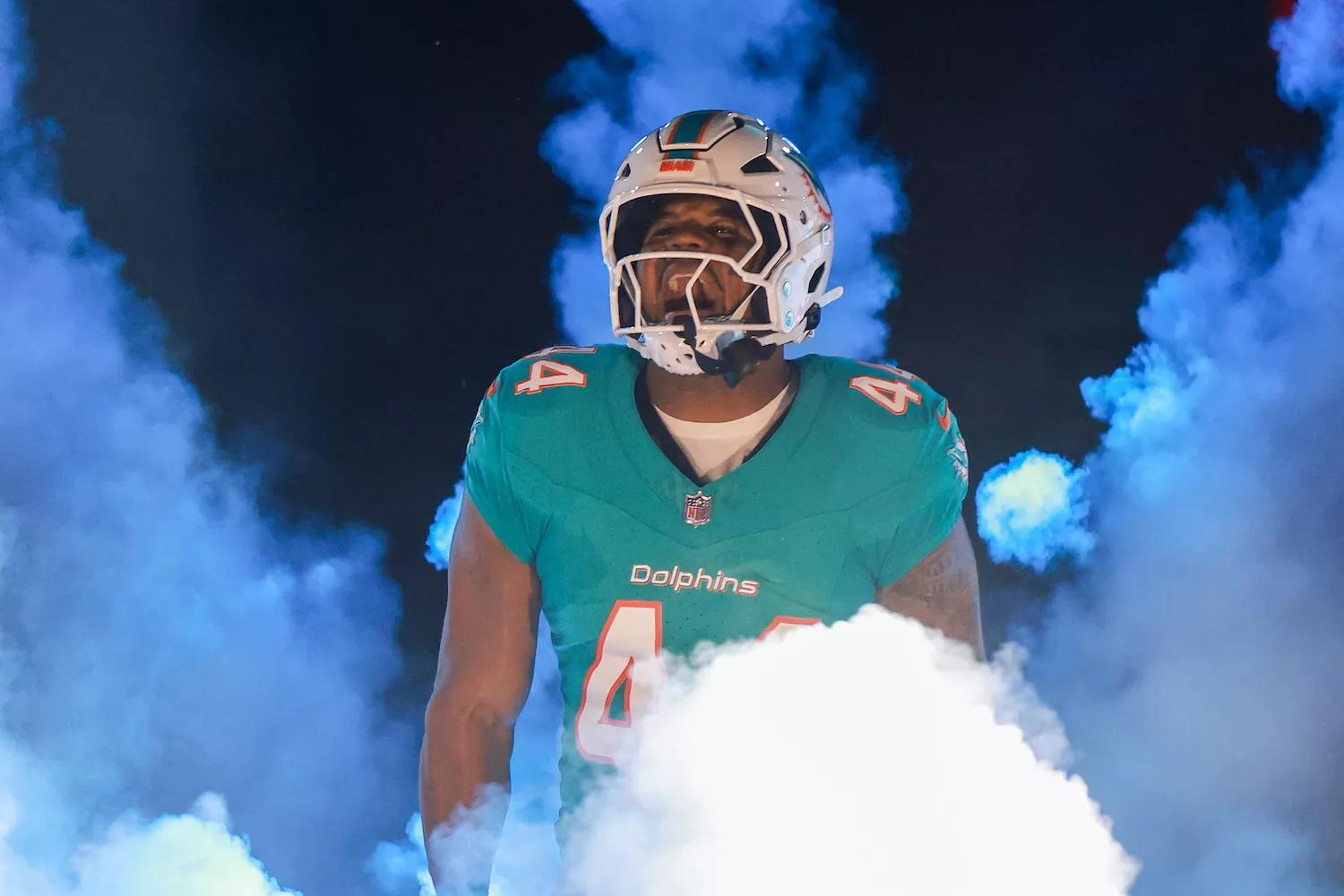 Chop Robinson #44 of the Miami Dolphins takes the field before playing the Tennessee Titans at Hard Rock Stadium on September 30, 2024, in Miami Gardens, Florida