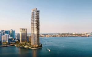 Rendering of two skyscrapers overlooking a body of water.