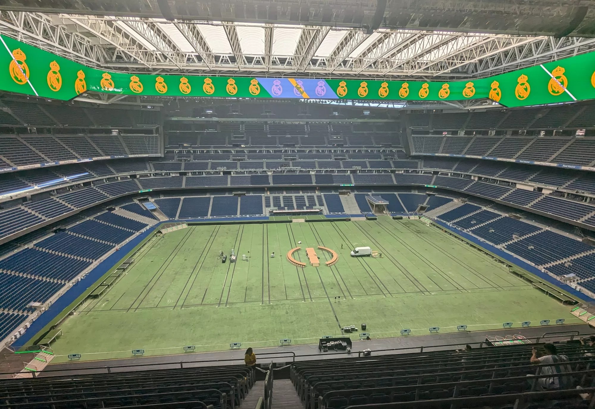 a 2024 view of the retractable roof, playing field, and stands at the newly remodeled Estadio Santiago Bernabéu in Madrid, Spain