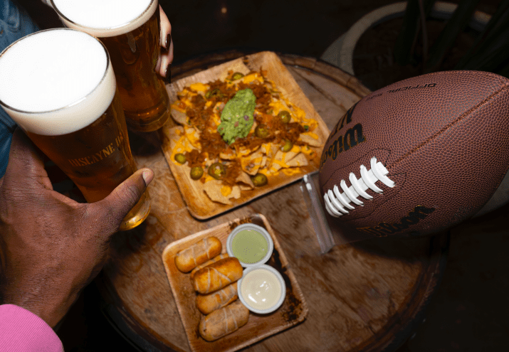 hands and beer and football