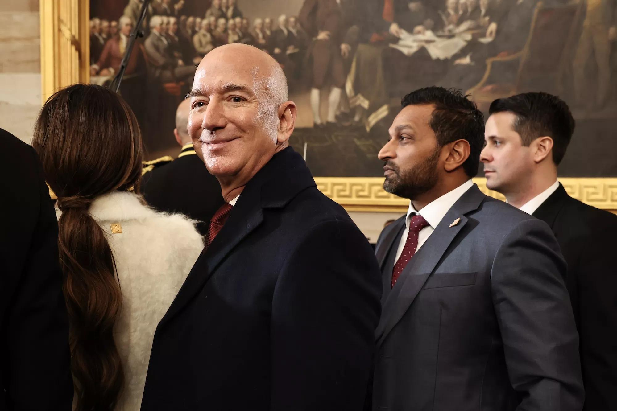 Founder of Amazon and Blue Origin Jeff Bezos and Kash Patel, President Trump's nominee for FBI director, depart inauguration ceremonies in the Rotunda of the U.S. Capitol on January 20, 2025 in Washington, D.C.