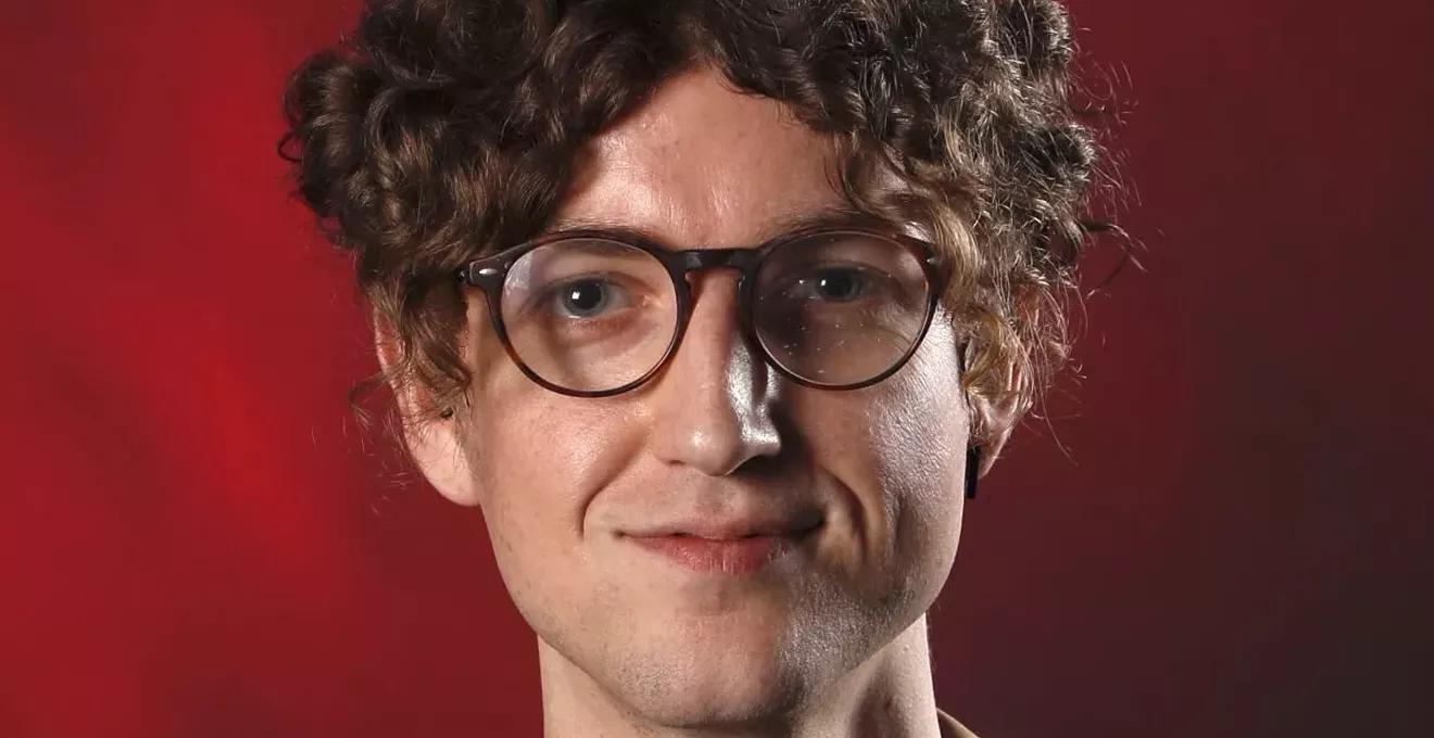 A journalist's headshot.