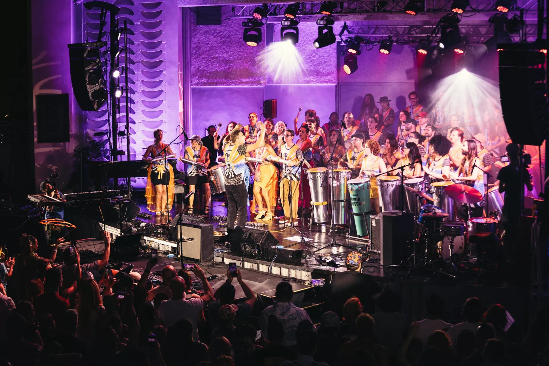 a percussion ensemble performs on stage at the Miami Beach Bandshell
