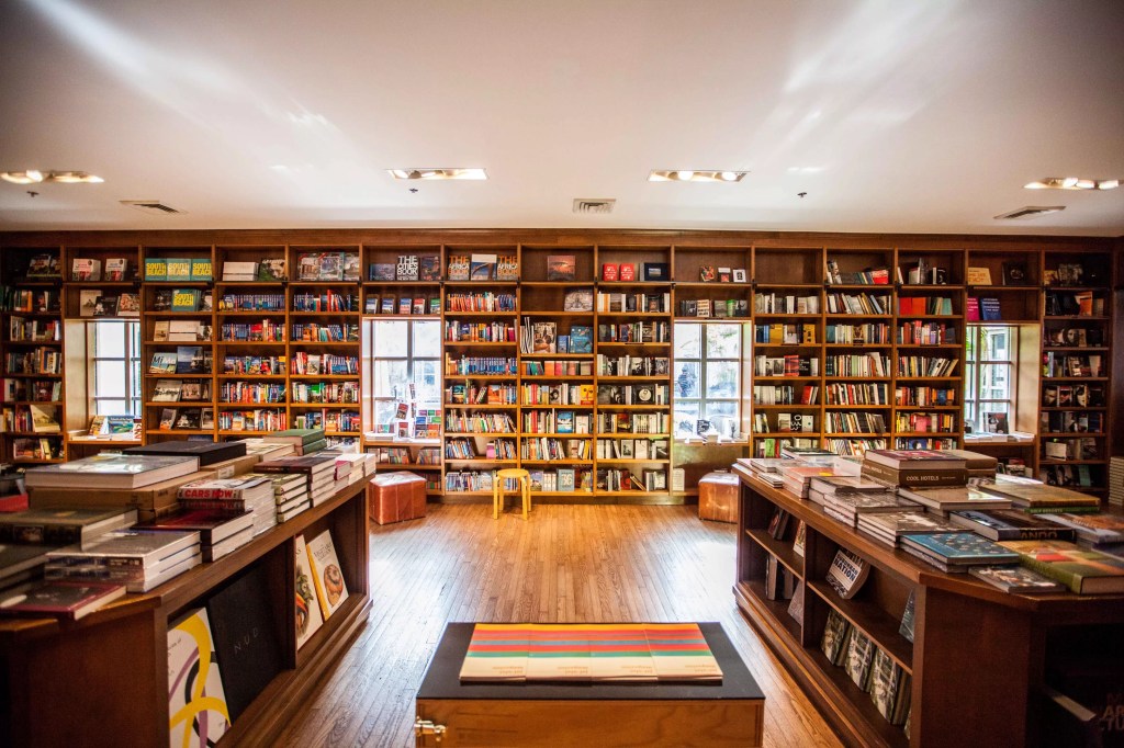 A bookstore with floor-to-ceiling bookshelves