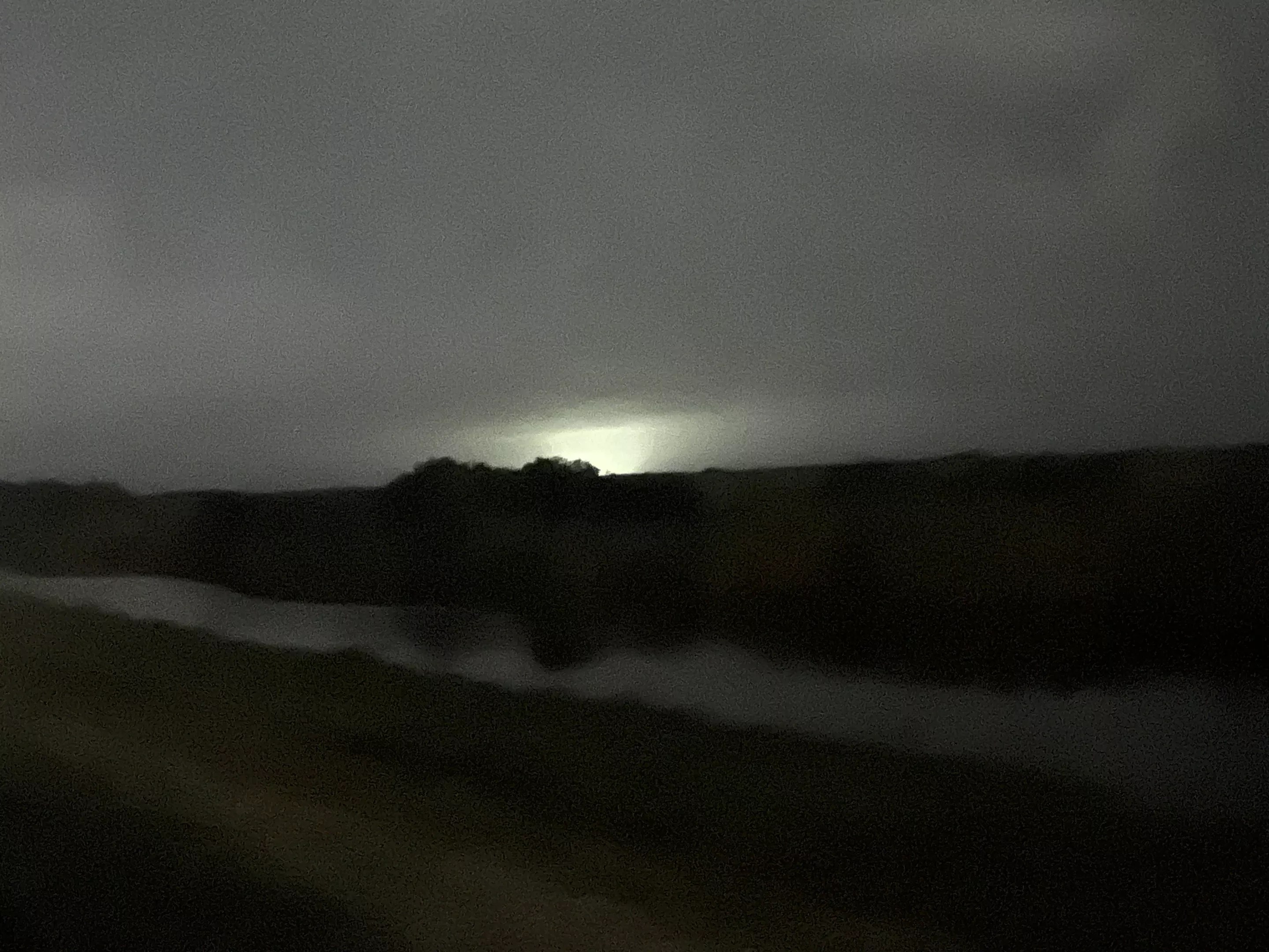 Big Cypress from a distance, illuminated by the newly built Alligator Alcatraz.