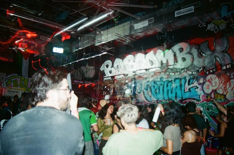 People dancing at a warehouse