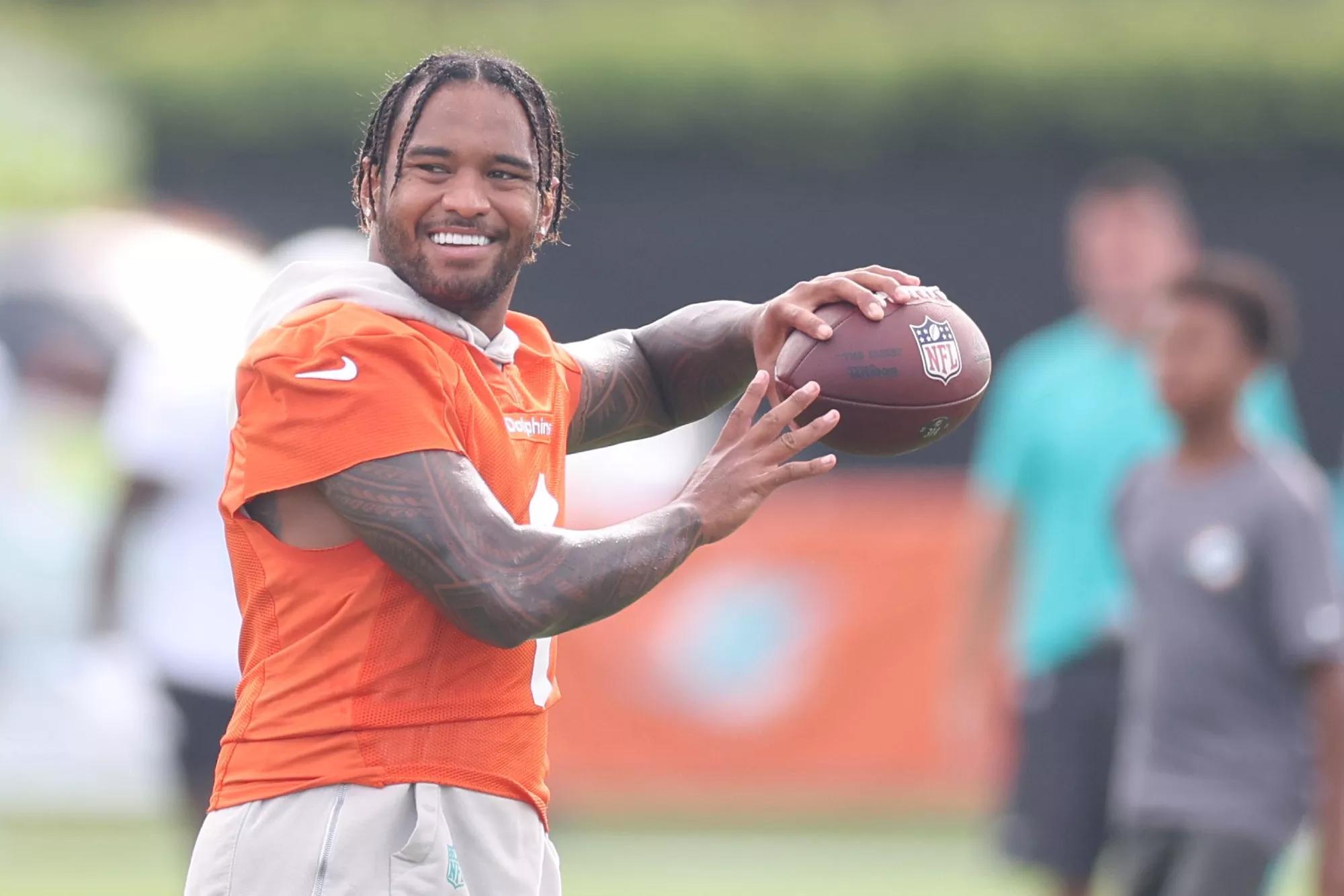 Tua Tagovailoa #1 of the Miami Dolphins practices at Baptist Health Training Complex on July 28, 2025 in Miami Gardens, Florida