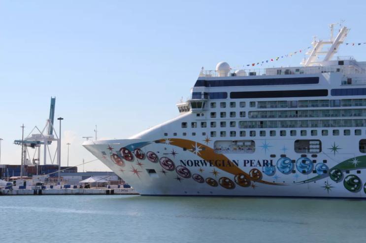 A cruise ship sits on the ocean