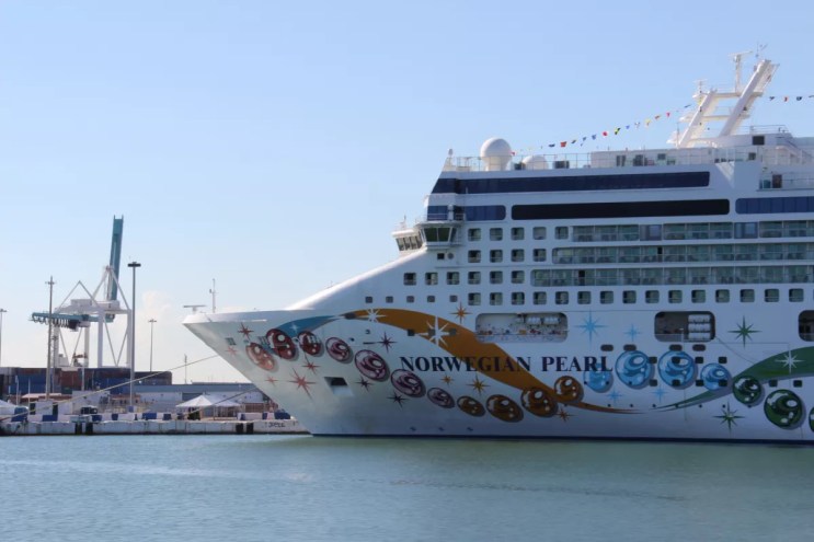 A cruise ship sits on the ocean