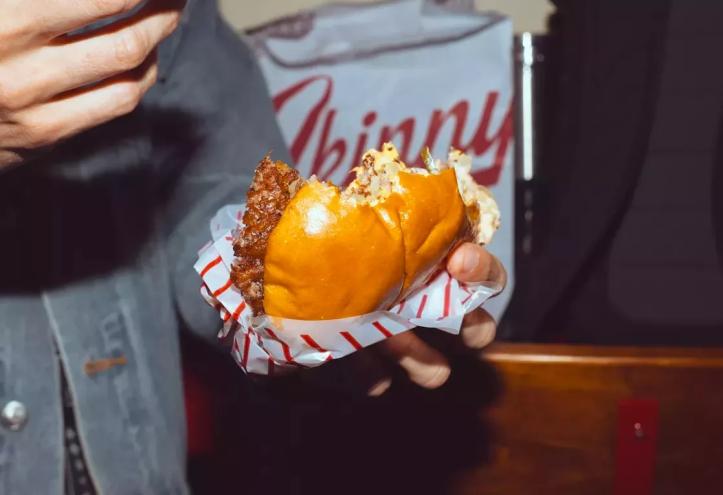 holding burger