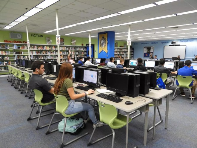 Pictured are high school students working on computers in a computer lab in a Hialeah high school.