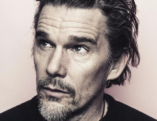 close-up sepia-toned headshot of actor Ethan Hawke